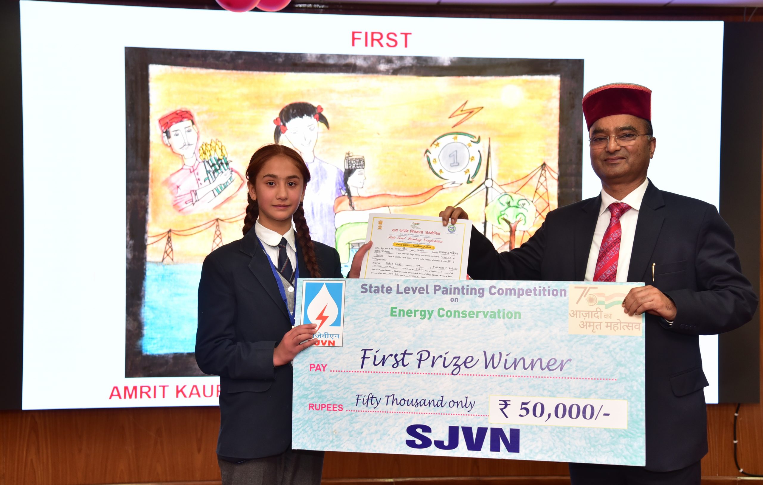Photo of Nand Lal Sharma awards the winners of State Level Painting Competition on Energy Conservation