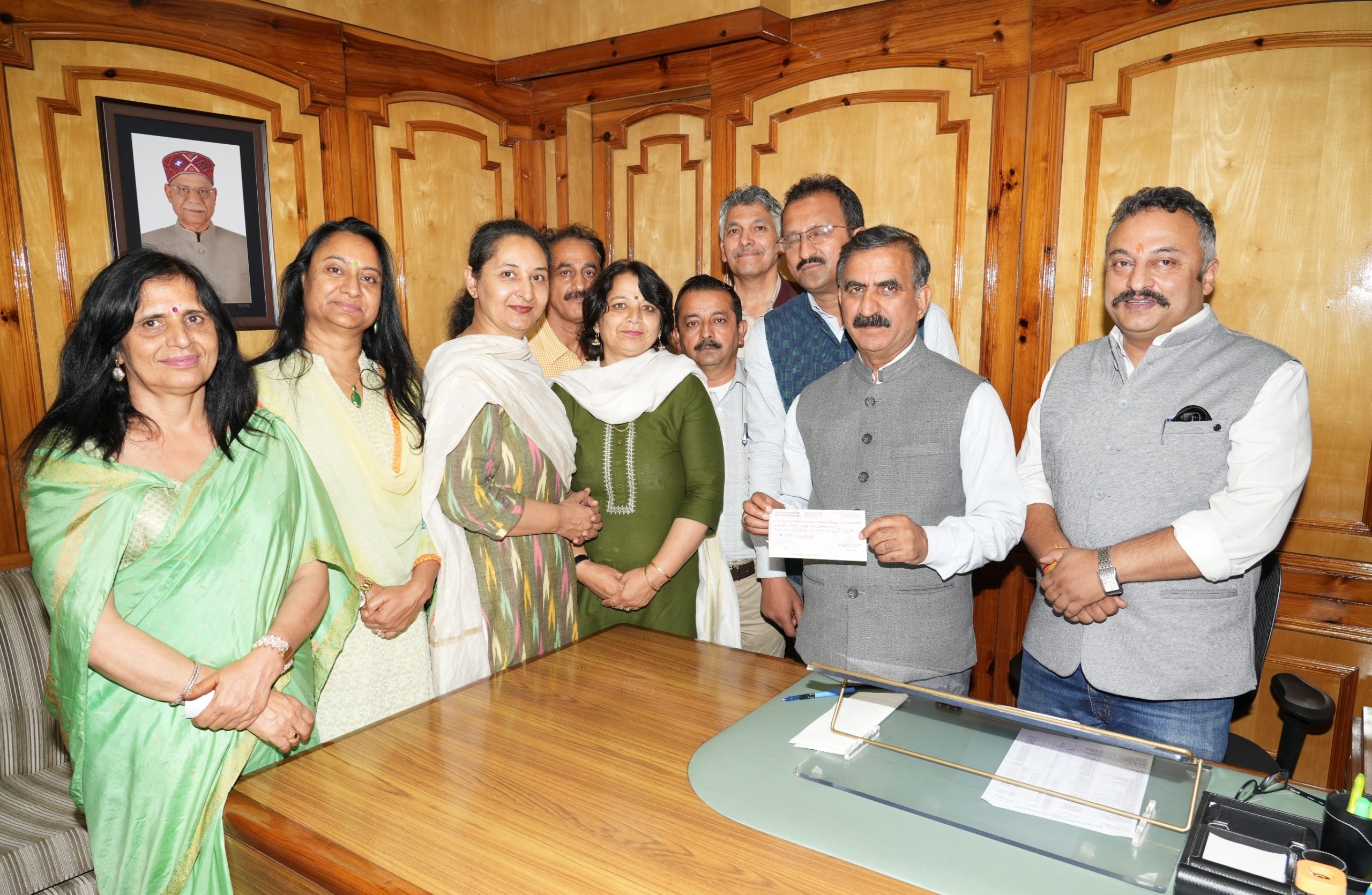 Photo of Principal RKMV Shimla presented a cheque of Rupees One Lakh Sixty One Thousand to Chief Minister